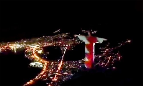 Christ the Redeemer statue in Rio de Janeiro lit up with Bahrain flag