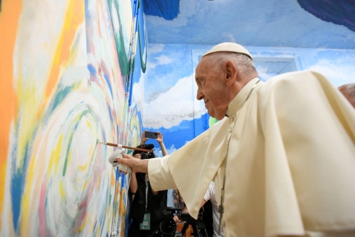 Not exactly Michelangelo, Pope Francis tries his hand at mural painting