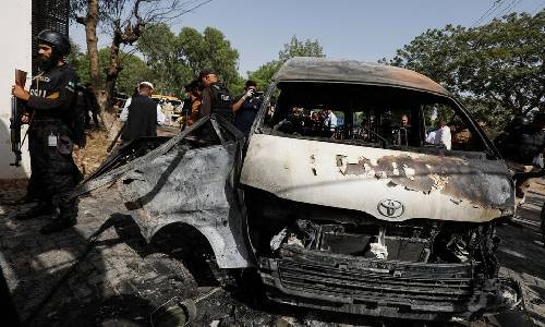 Female suicide bomber kills three Chinese teachers and Pakistani at Karachi university
