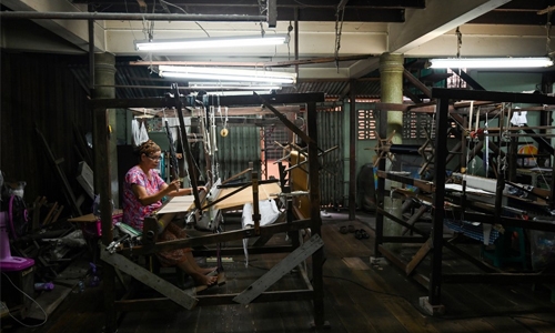 Thai Muslim family keeps silk weaving heritage alive Bangkok 