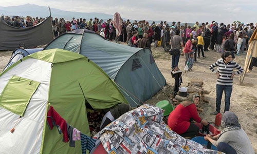 Refugee hit by police car in Greek camp dies