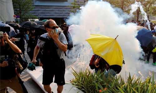 Hong Kong police fire tear gas, water cannon