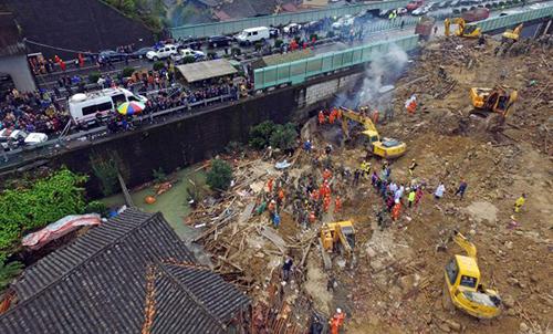 Flood-sparked landslide kills 16 in China