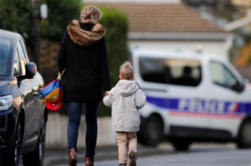 French schools hold minute's silence in for slain teacher