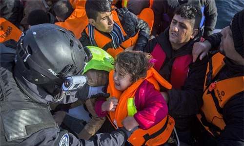 Six children drown as refugee boat sinks off Turkey