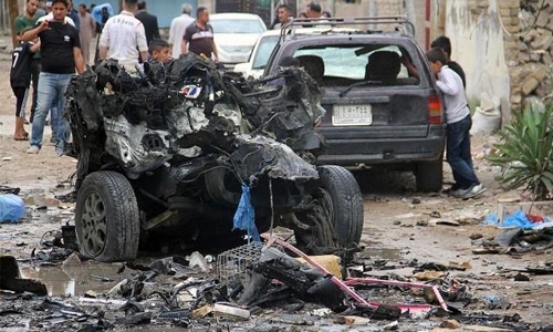 Baghdad market bombing kills 52 