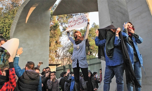 Iran government warns  as protests  gather momentum  