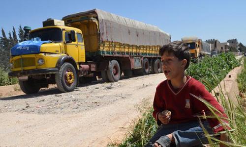 Aid deliveries begin in Syria towns under truce