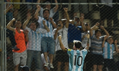 Messi magic sparks Argentina, Brazil march on