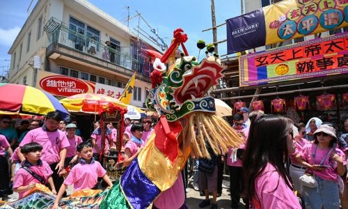 Child mascots and bun towers: Hong Kong keeps island traditions alive