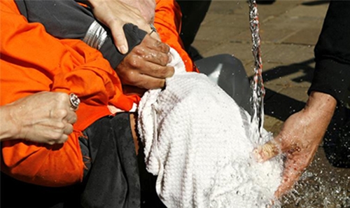 Most Americans back torture of 'terror' suspects: poll