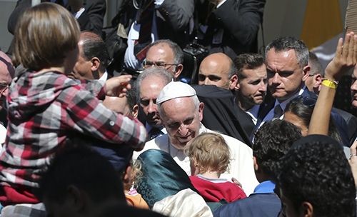 'We are all migrants', Pope says on Lesbos