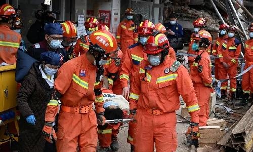 At least 53 dead in China building collapse, search for trapped ends 