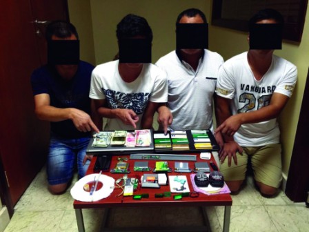 Four held for bank data theft