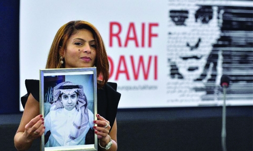 Saudi blogger's wife accepts EU Sakharov prize for jailed husband