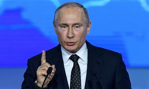 Putin to develop missiles if US leaves Cold war treaty