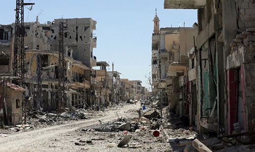 Twin bombings kill 10 civilians in central Syria