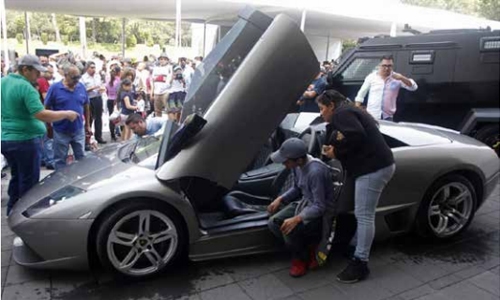 Mexico auctions seized vehicles outside presidential mansion
