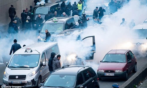 Violent protests in Paris against Uber taxi