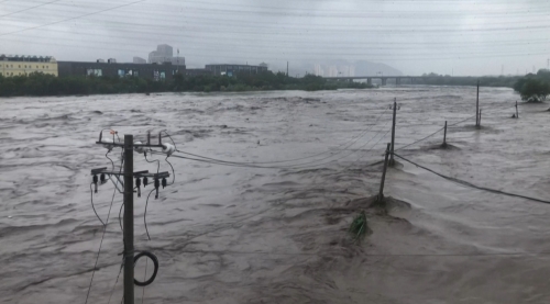 Beijing on alert with two killed as heavy rain batters north China