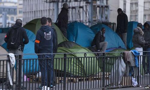 Paris police clear last migrant camp