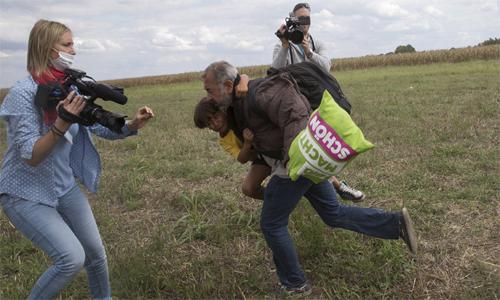 ‘My life is ruined’: Refugee-tripping Hungarian camerawoman to sue Facebook, may move to Russia