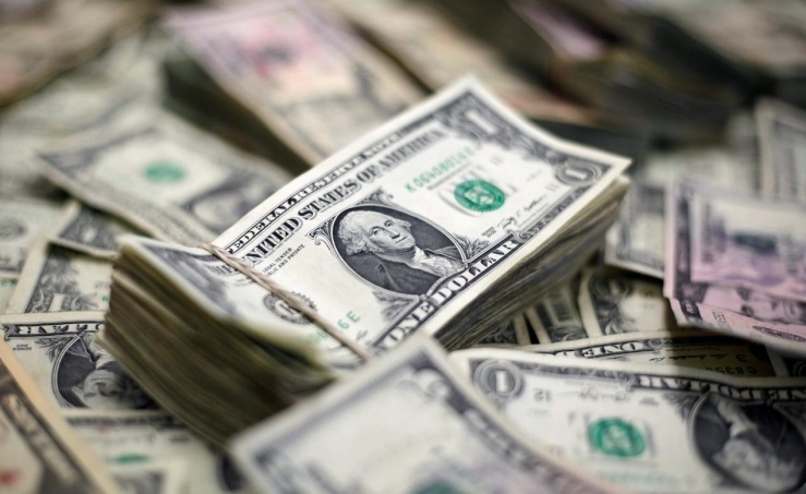 Dollar held back on virus hopes
