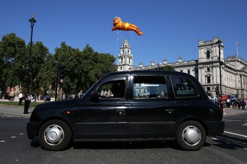 Balloon of mayor Khan in bikini flies over London