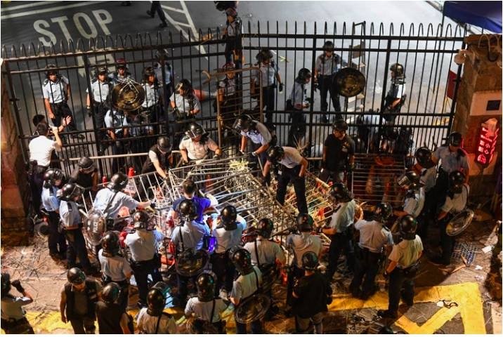 Hong Kong police vow to pursue protesters
