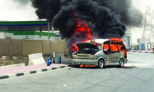 Vehicle on fire on Beach Road