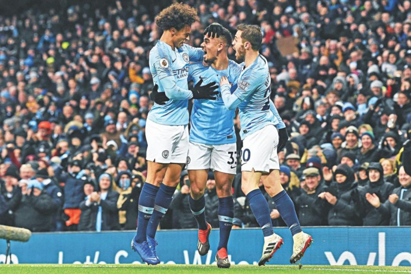 City regain top spot