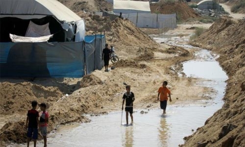 14 rescued from flooded Gaza tunnel