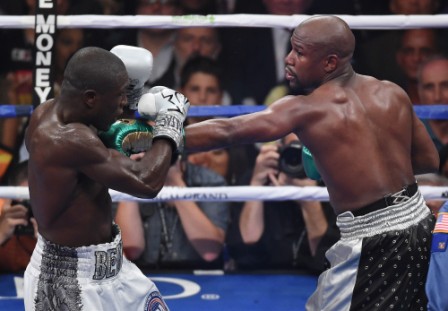 Mayweather beats Berto and says 'it's over'