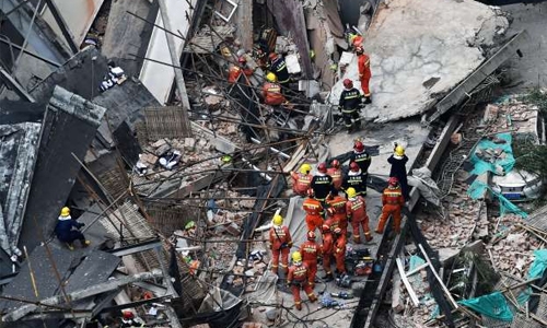Nine workers trapped in Shanghai roof collapse: govt