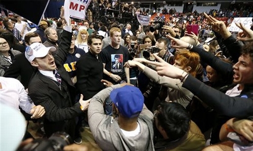 Trump under fire from rivals for rally violence
