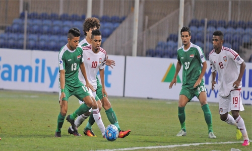 Iran hold title holders Qatar