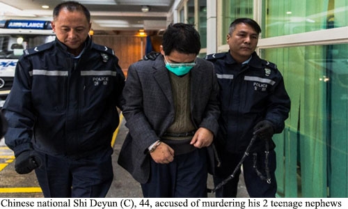 Double murder suspect held in Hong Kong says he is ill