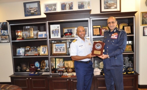 Coast Guard commander receives US official